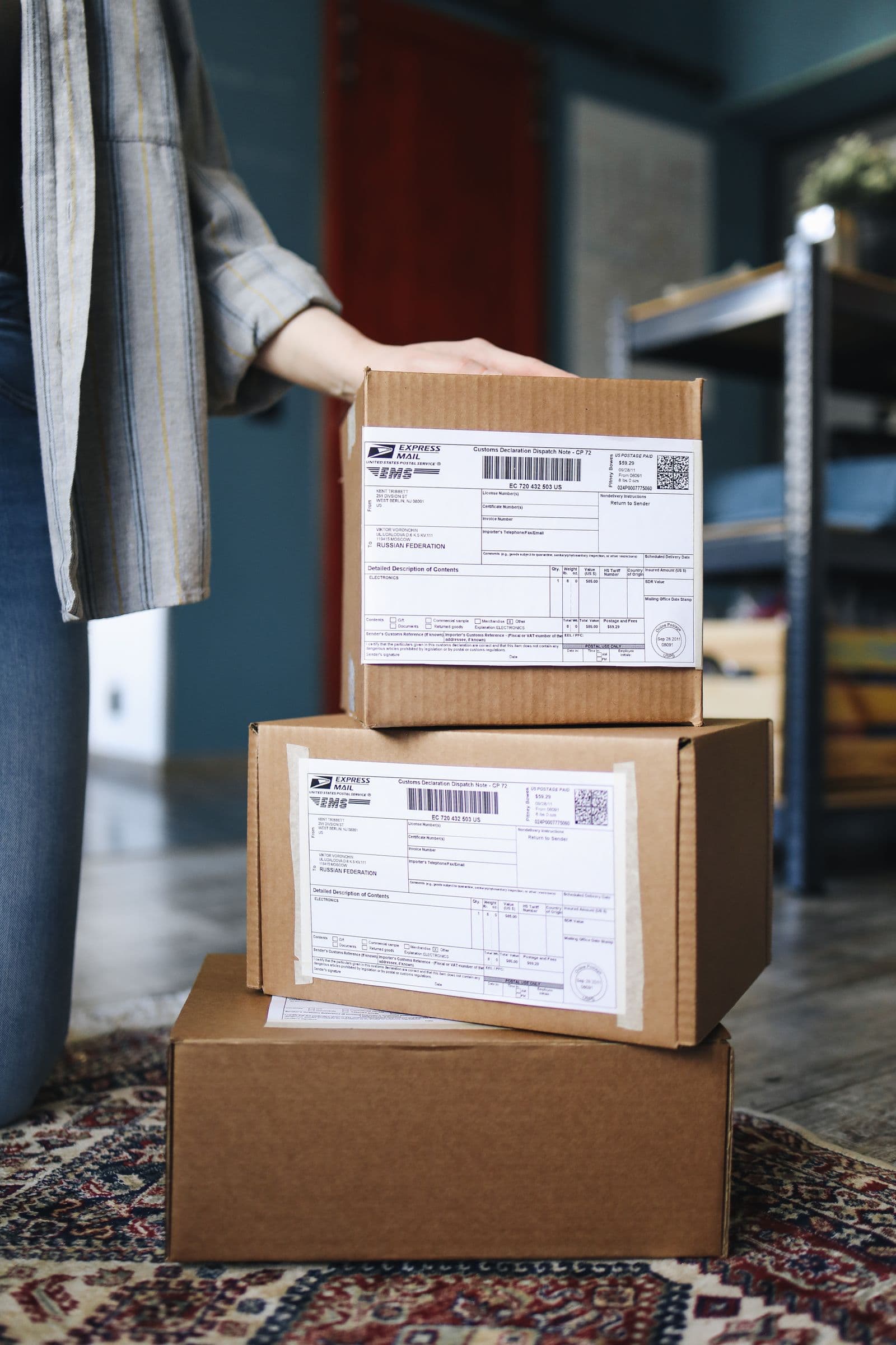 Stacked parcels with shipping labels ready for export